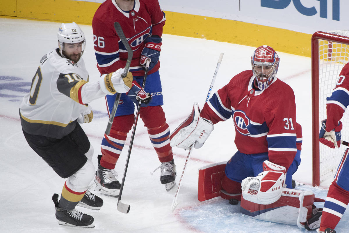 Vegas Golden Knights' Nicolas Roy (10) scores against Montreal Canadiens goaltender Carey Price ...