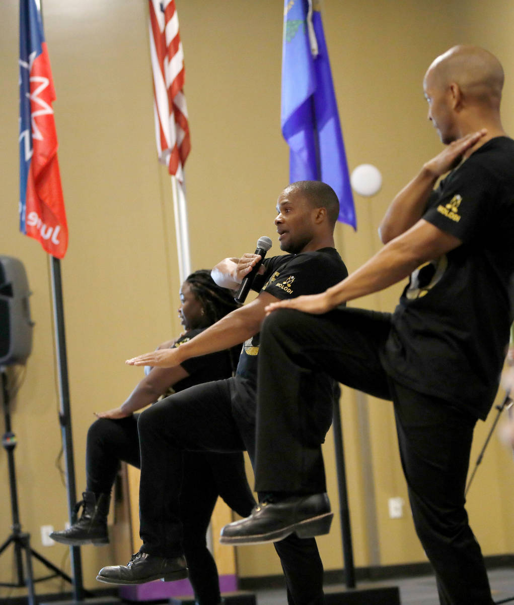 Members of Molodi, a performance ensemble, Danielle Hicks, from left, Director Jason Nious, and ...