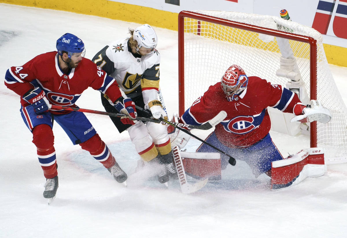 Montreal Canadiens goaltender Carey Price stops Vegas Golden Knights' William Karlsson, who he ...