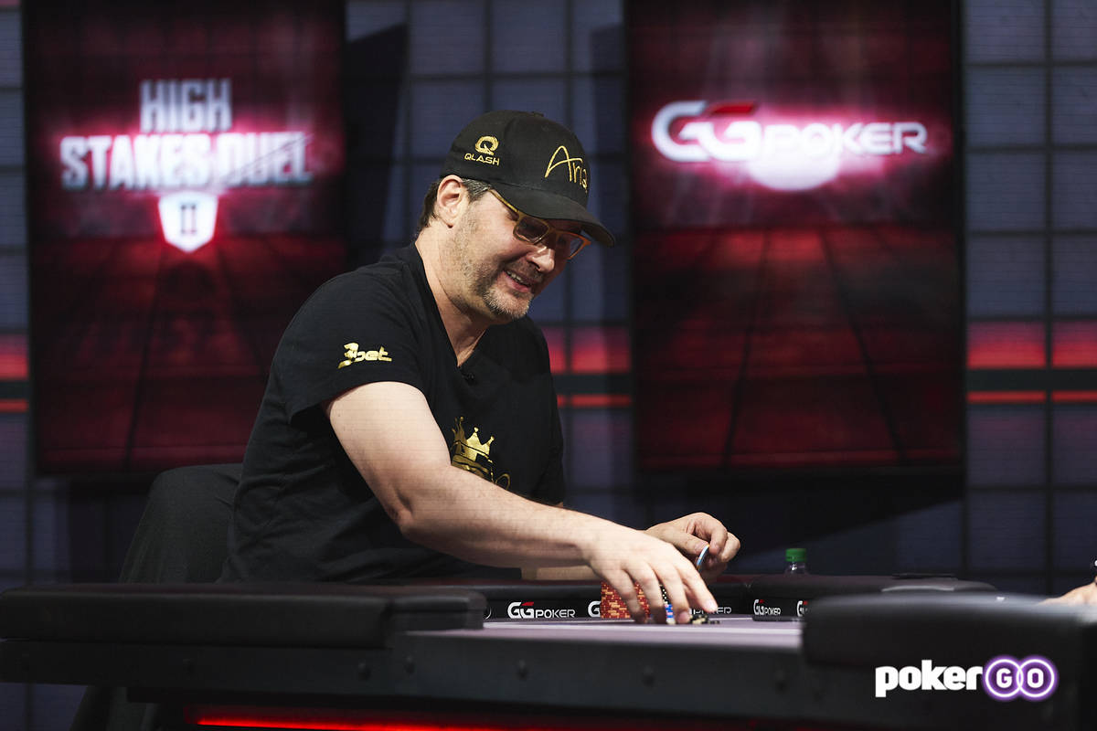 Phil Hellmuth plays in the second round of his "High Stakes Duel" with Daniel Negreanu at the P ...