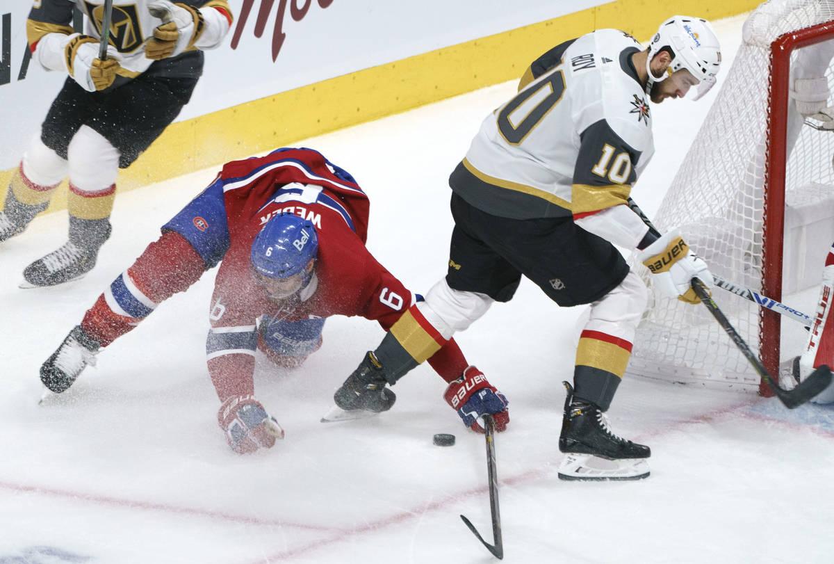 Montreal Canadiens defenseman Shea Weber (6) tries to clear the puck away from Vegas Golden Kni ...