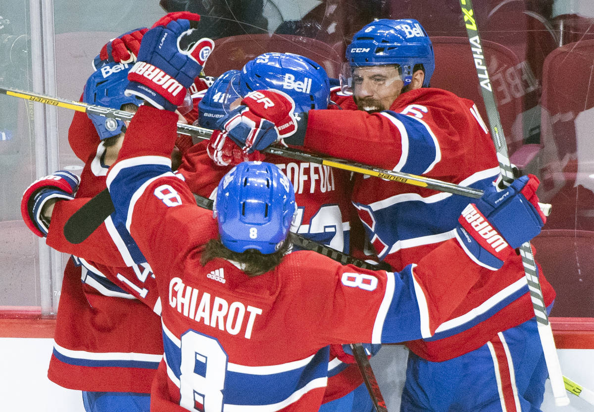 Montreal Canadiens' Paul Byron (41) celebrates his goal with teammates during the second period ...