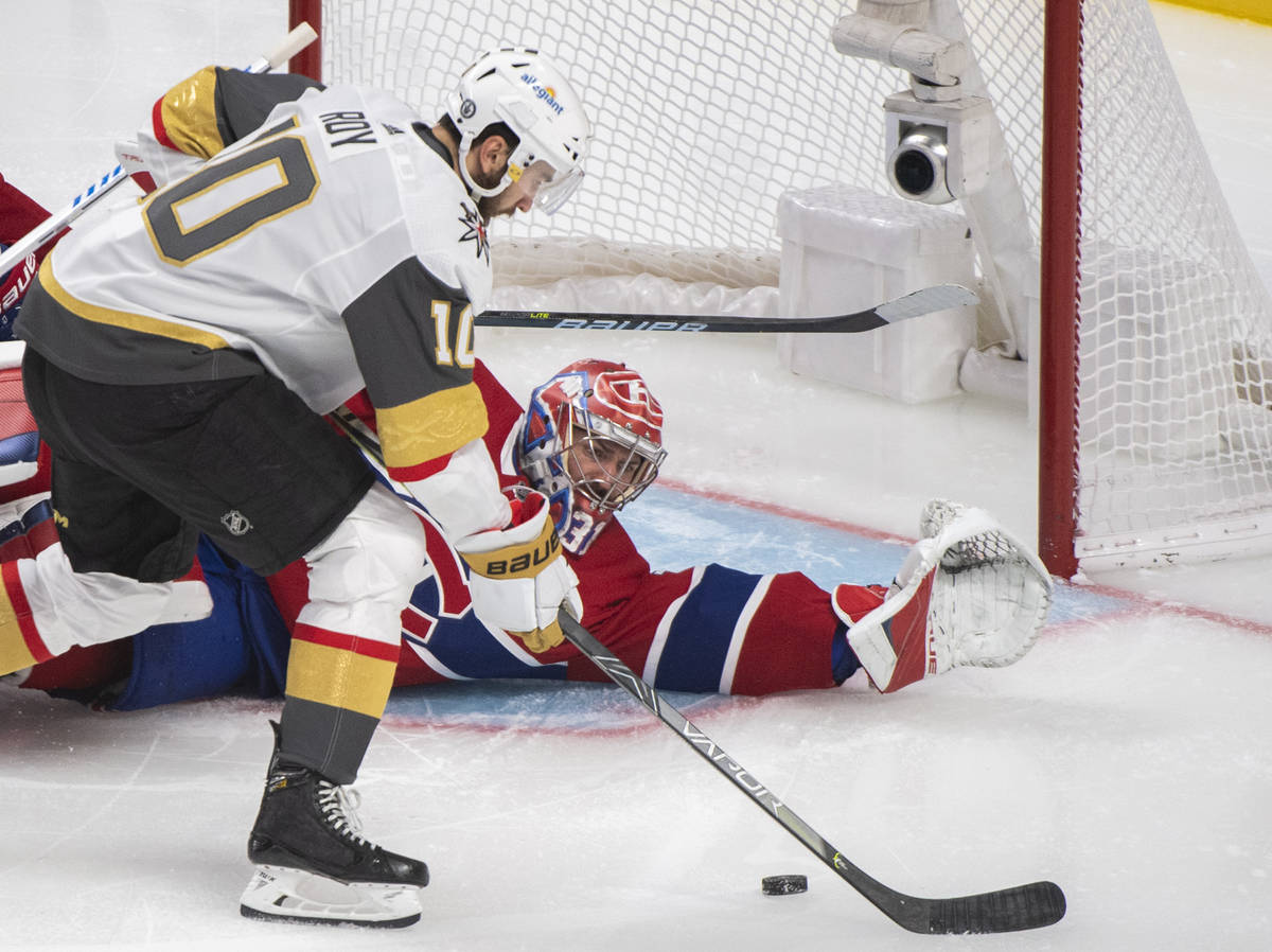 Vegas Golden Knights' Nicolas Roy scores against Montreal Canadiens goaltender Carey Price duri ...