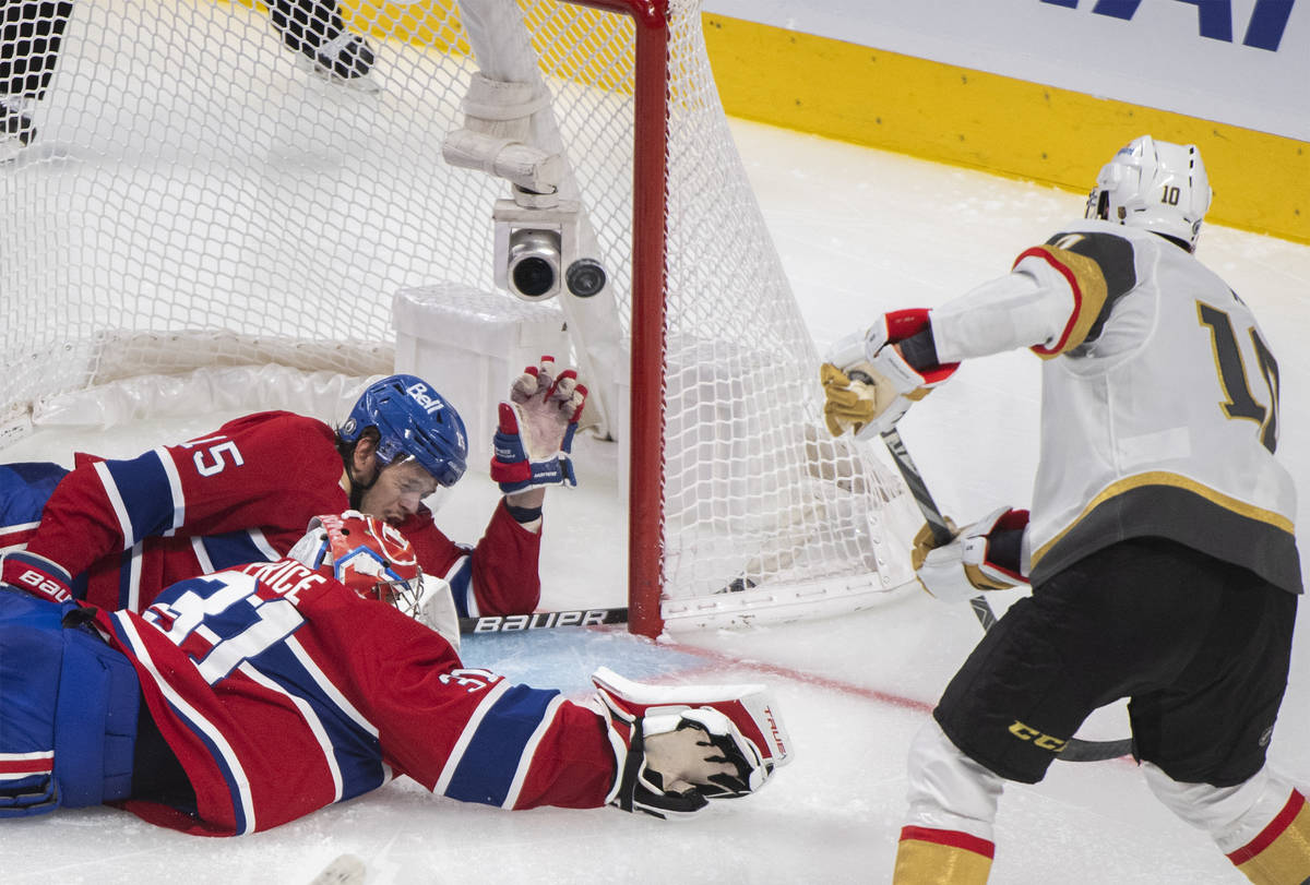 Vegas Golden Knights' Nicolas Roy (10) scores against Montreal Canadiens goaltender Carey Price ...