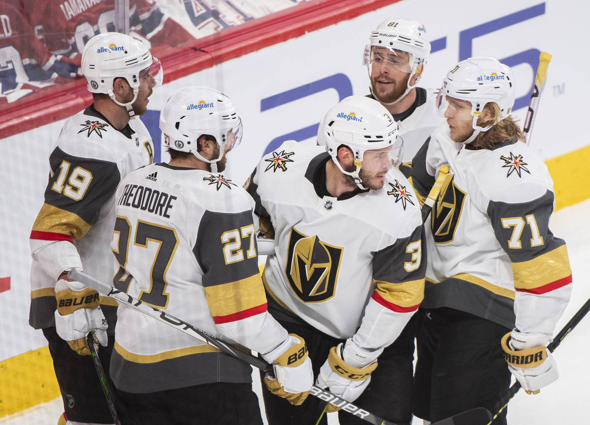 Vegas Golden Knights' Brayden McNabb (3) celebrates his goal against the Montreal Canadiens wit ...