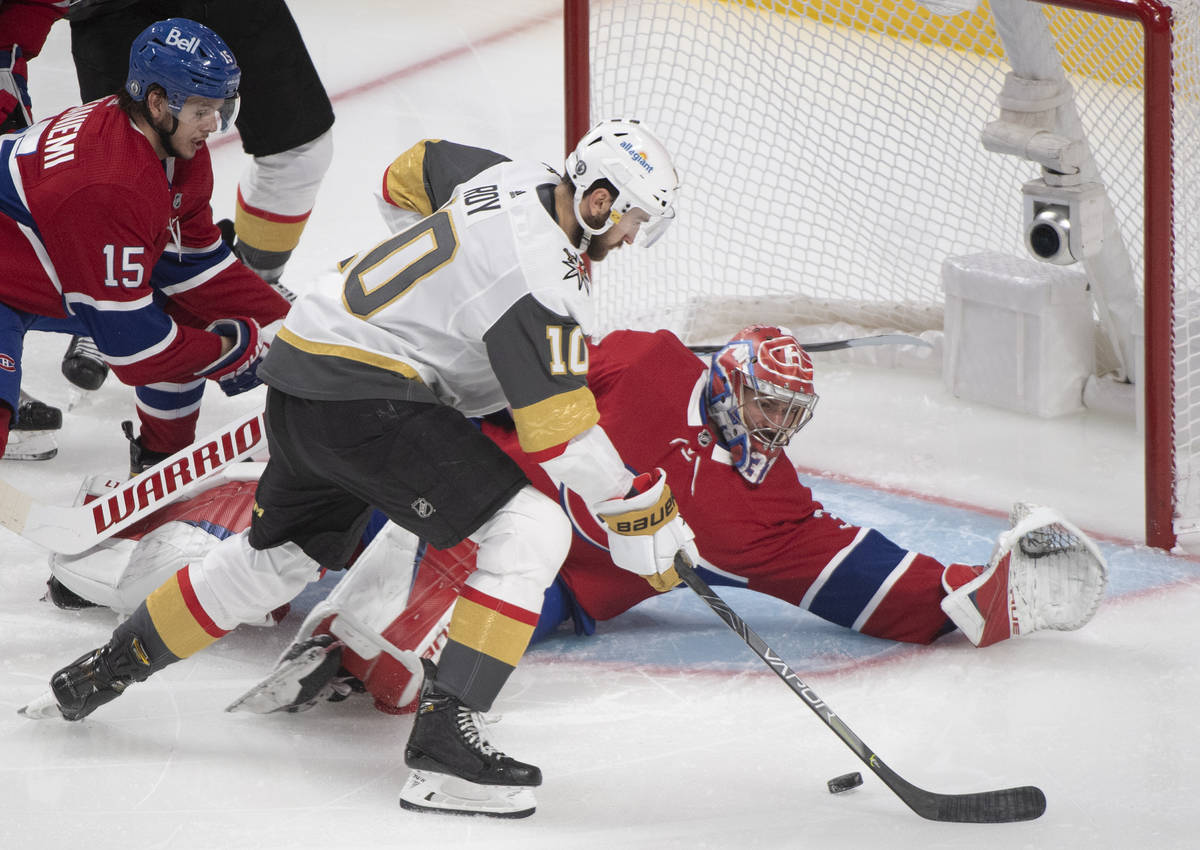 Vegas Golden Knights' Nicolas Roy scores against Montreal Canadiens goaltender Carey Price duri ...