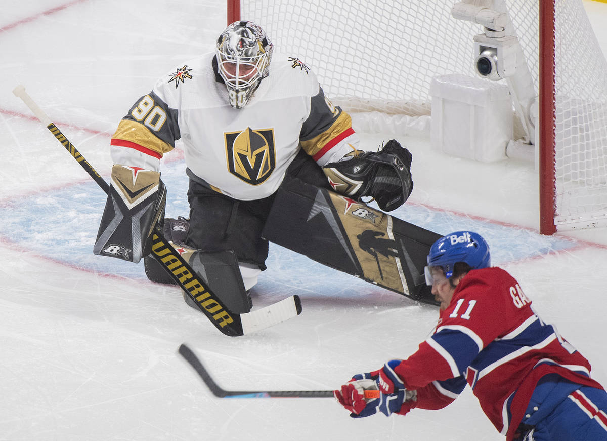 Montreal Canadiens' Brendan Gallagher (11) shoots against Vegas Golden Knights goaltender Robin ...