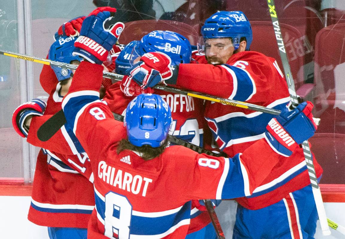 Montreal Canadiens' Paul Byron (41) celebrates his goal with teammates during the second period ...