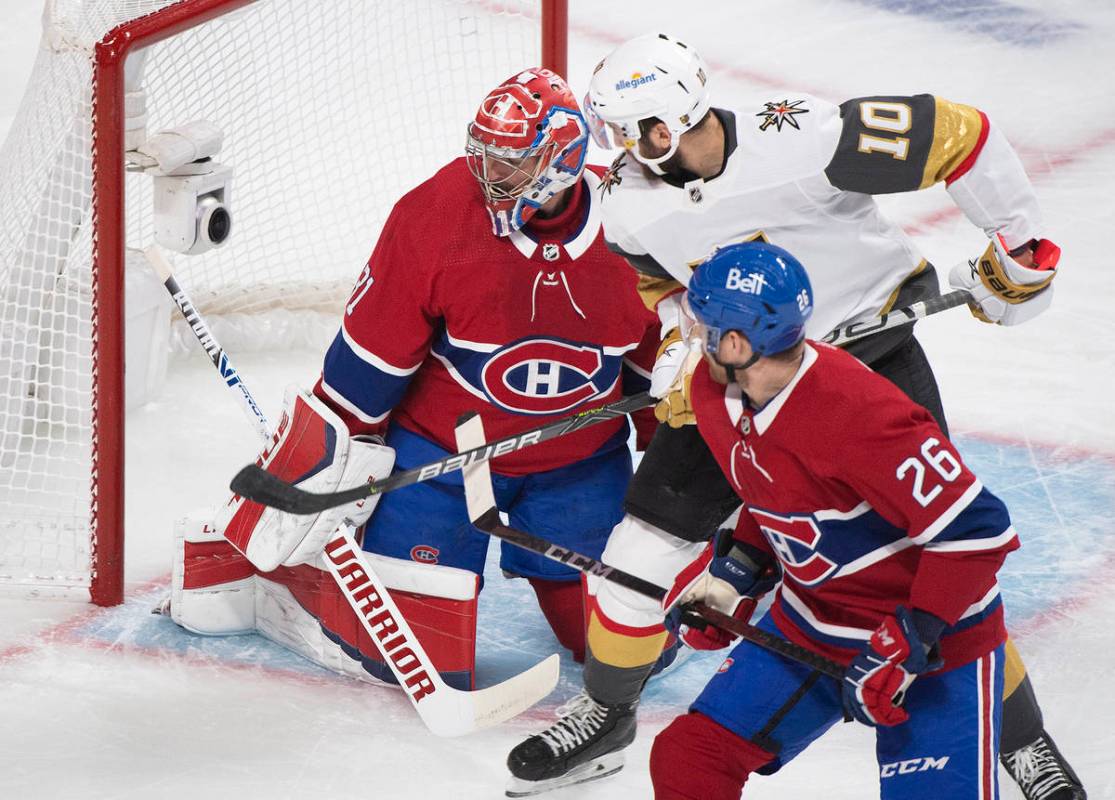 Vegas Golden Knights' Nicolas Roy (10) moves in aagainst Montreal Canadiens goaltender Carey Pr ...