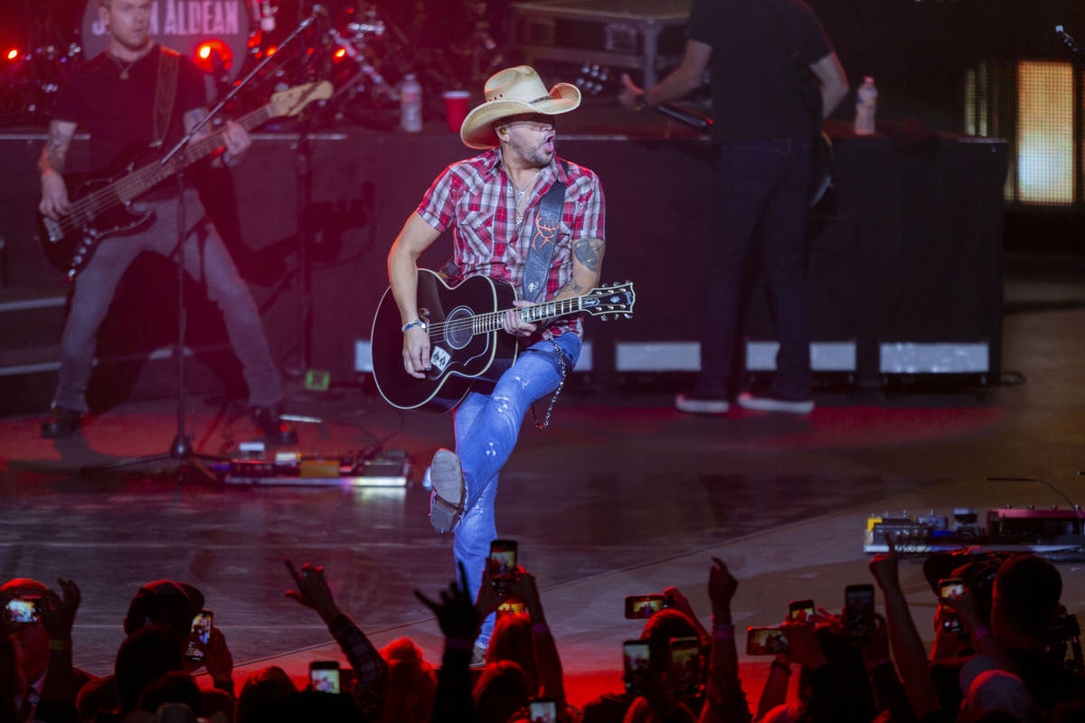 Jason Aldean performs at the Park MGM's Park Theater in Las Vegas on Friday, Dec. 6, 2019. (Las ...