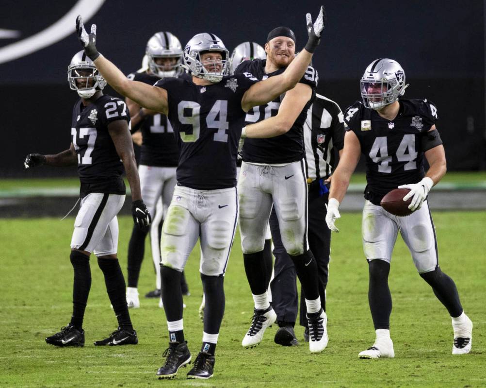 Las Vegas Raiders defensive end Carl Nassib (94) celebrates with Las Vegas Raiders inside lineb ...