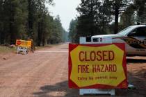 The Coconino County Sheriff's Office blocks off a U.S. Forest Service Road outside of Flagstaff ...