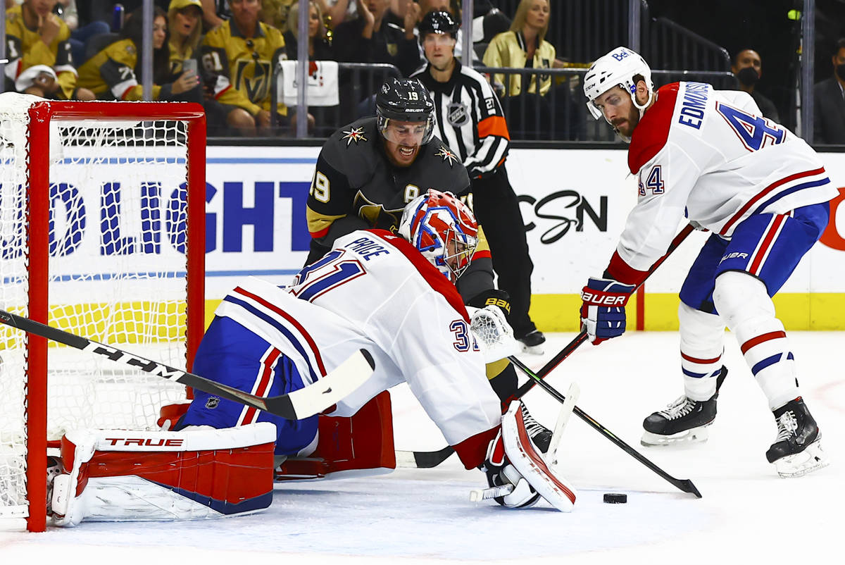Golden Knights' Reilly Smith (19) tries to get the puck in against Montreal Canadiens' goaltend ...
