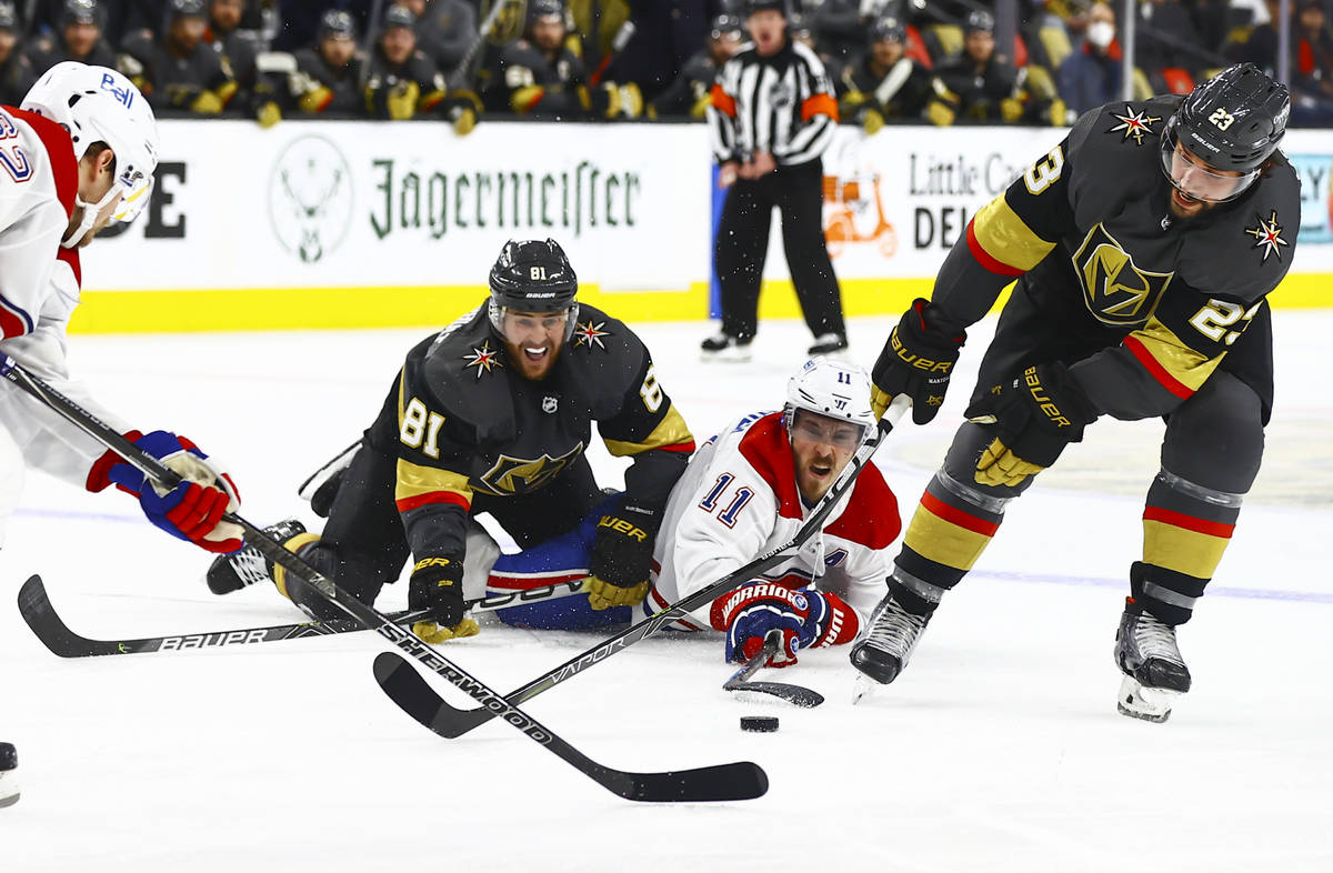 Montreal Canadiens' Brendan Gallagher (11) battles for the puck against Golden Knights' Jonatha ...