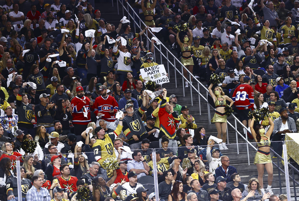Golden Knights fans cheer during the first period of Game 5 of an NHL hockey Stanley Cup semifi ...