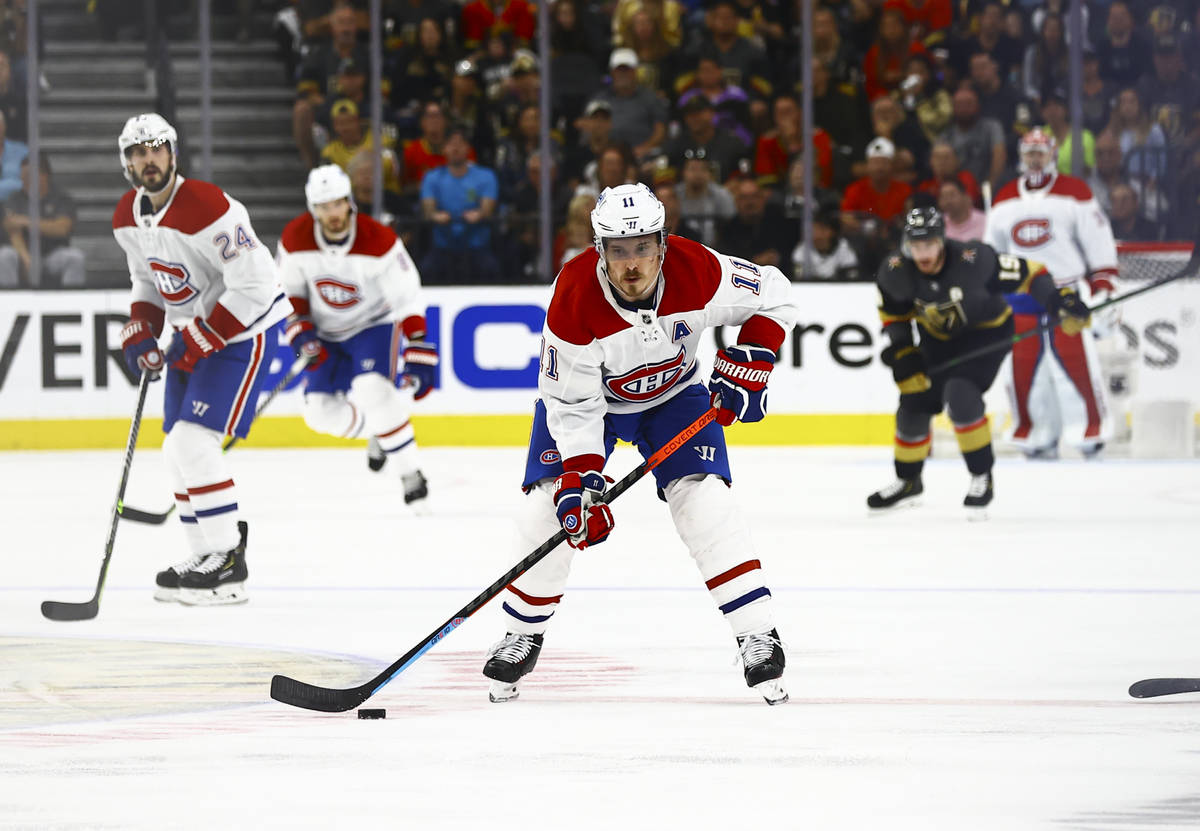 Montreal Canadiens' Brendan Gallagher (11) skates with the puck during the second period of Gam ...