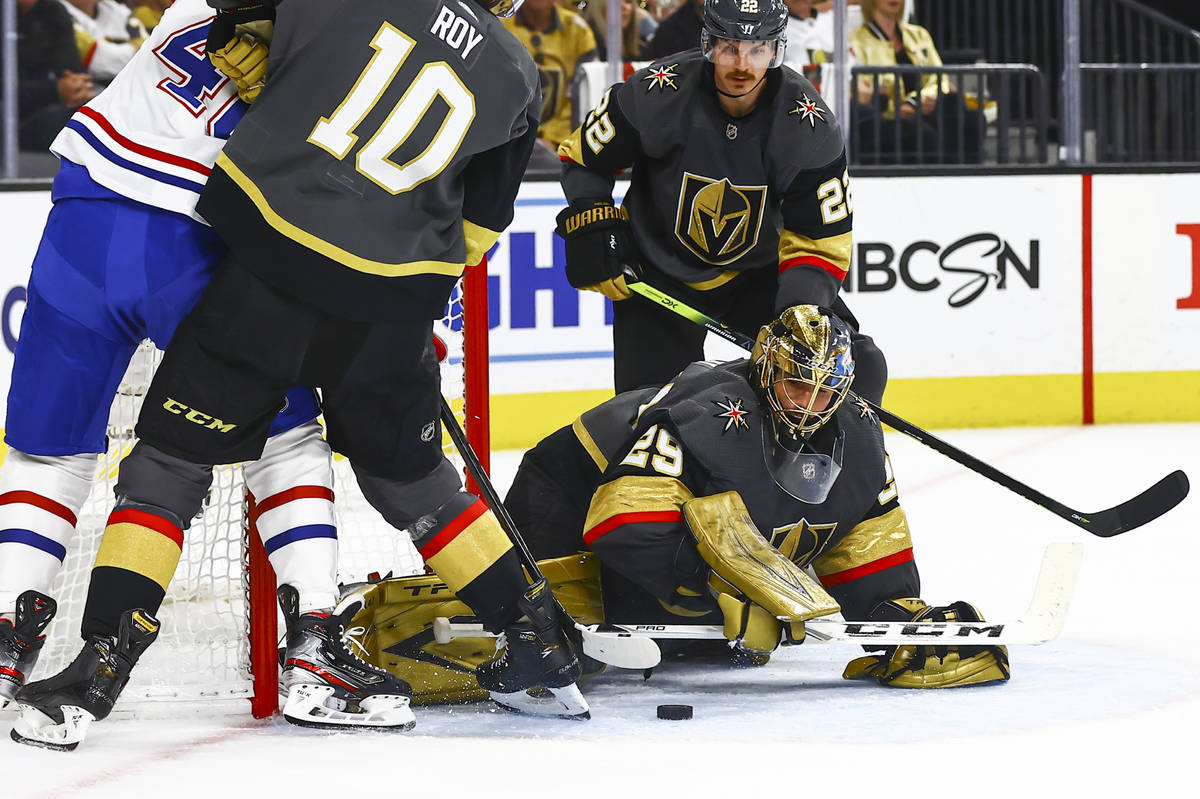 Golden Knights goaltender Marc-Andre Fleury (29) reaches out to stop the puck against the Montr ...