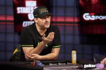 Phil Hellmuth plays in the third round of his "High Stakes Duel" with Daniel Negreanu on Wednes ...