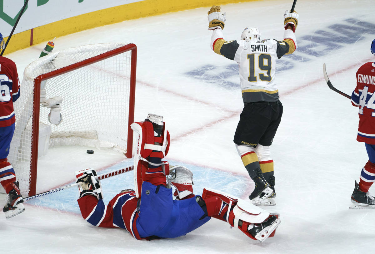 Vegas Golden Knights' Reilly Smith (19) celebrates his goal past Montreal Canadiens goaltender ...