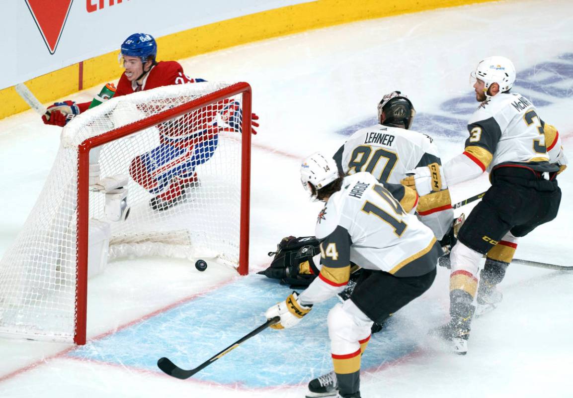 Montreal Canadiens' Cole Caufield (22) celebrates his goal past Vegas Golden Knights goaltender ...