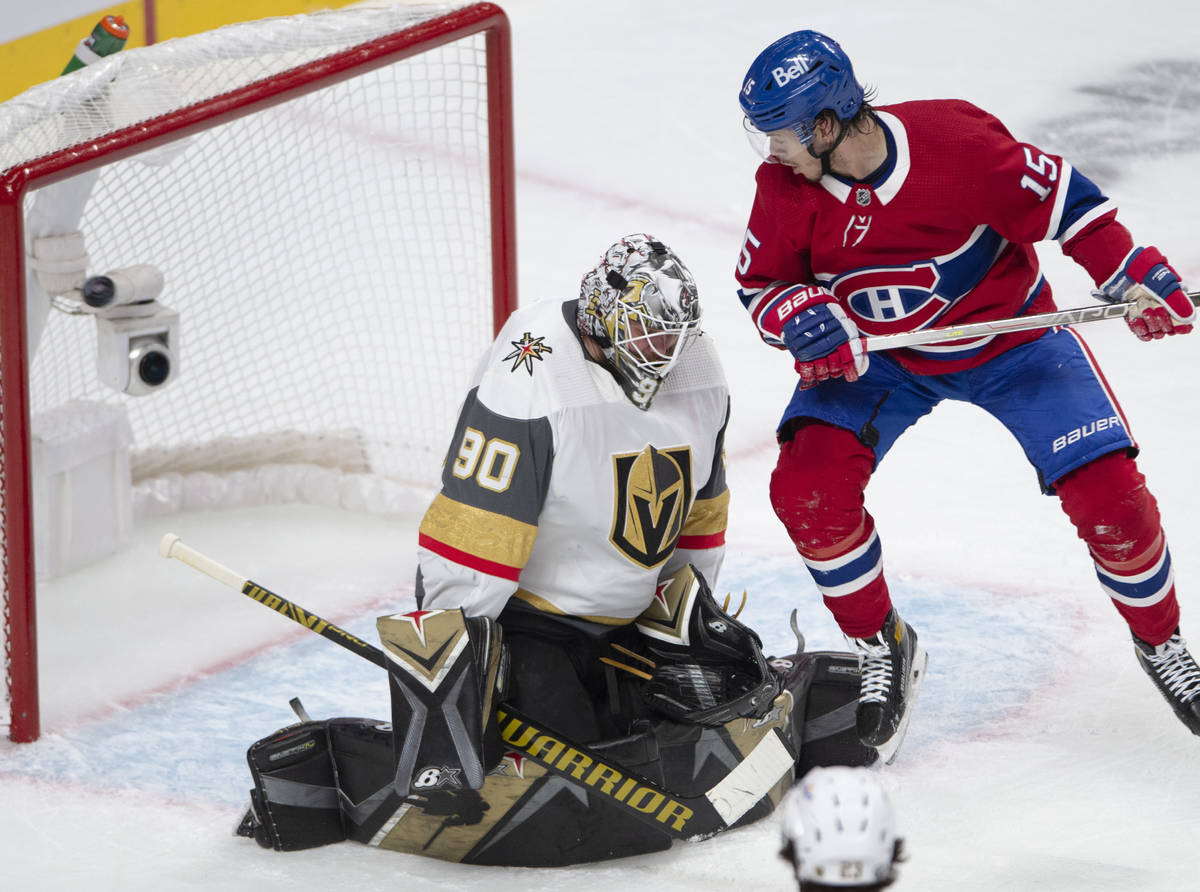 Montreal Canadiens' Jesperi Kotkaniemi (15) watches as Canadiens Shea Weber's (not shown) shot ...