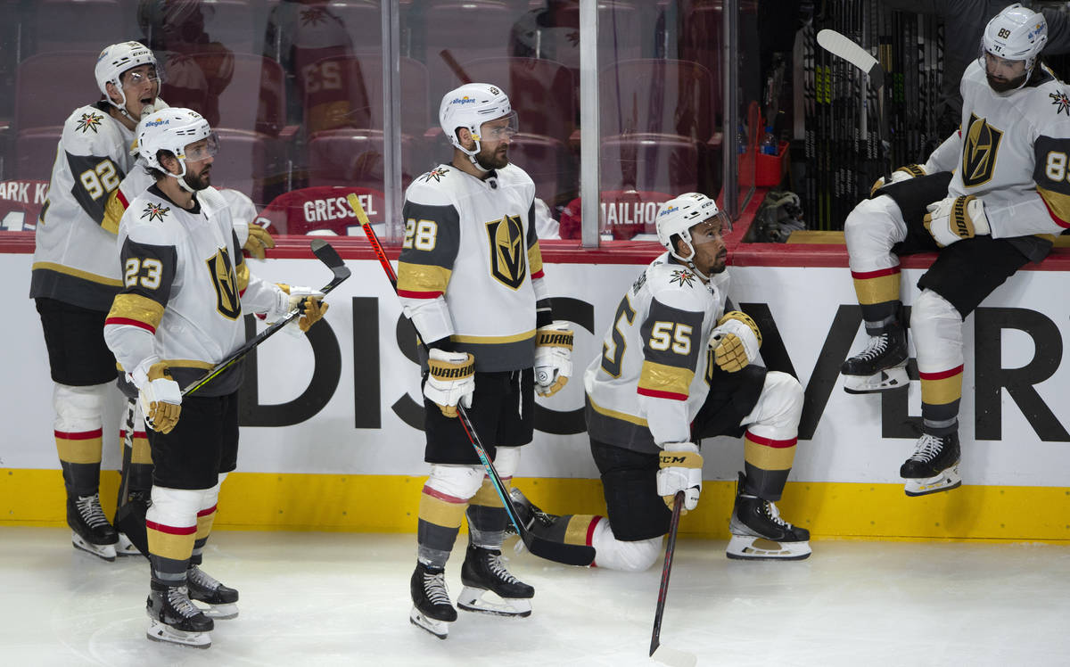 Vegas Golden Knights players watch the Montreal Canadiens celebrate following overtime in Game ...