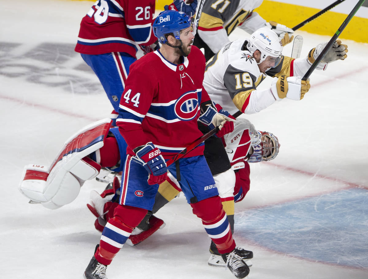 Vegas Golden Knights right wing Reilly Smith (19) celebrates over a falling Montreal Canadiens ...