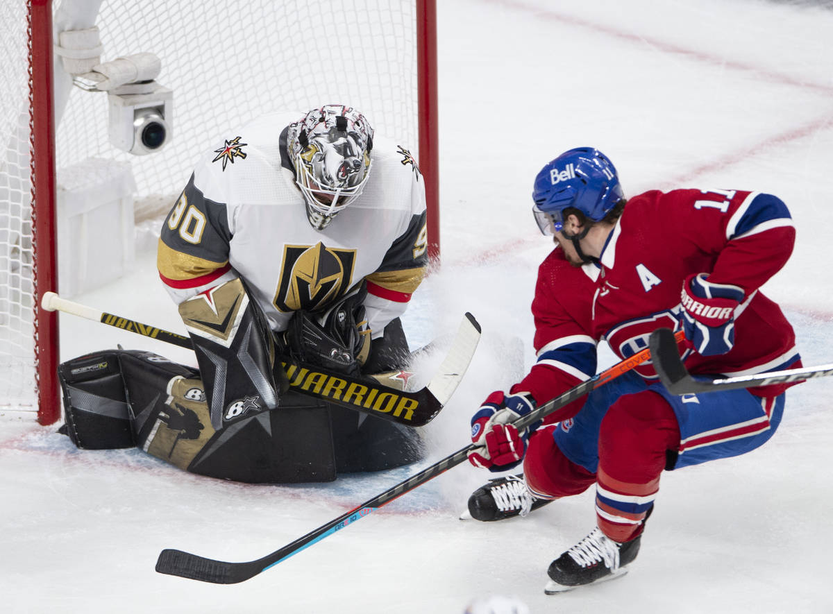 Montreal Canadiens right wing Brendan Gallagher (11) is stopped by Vegas Golden Knights goalten ...