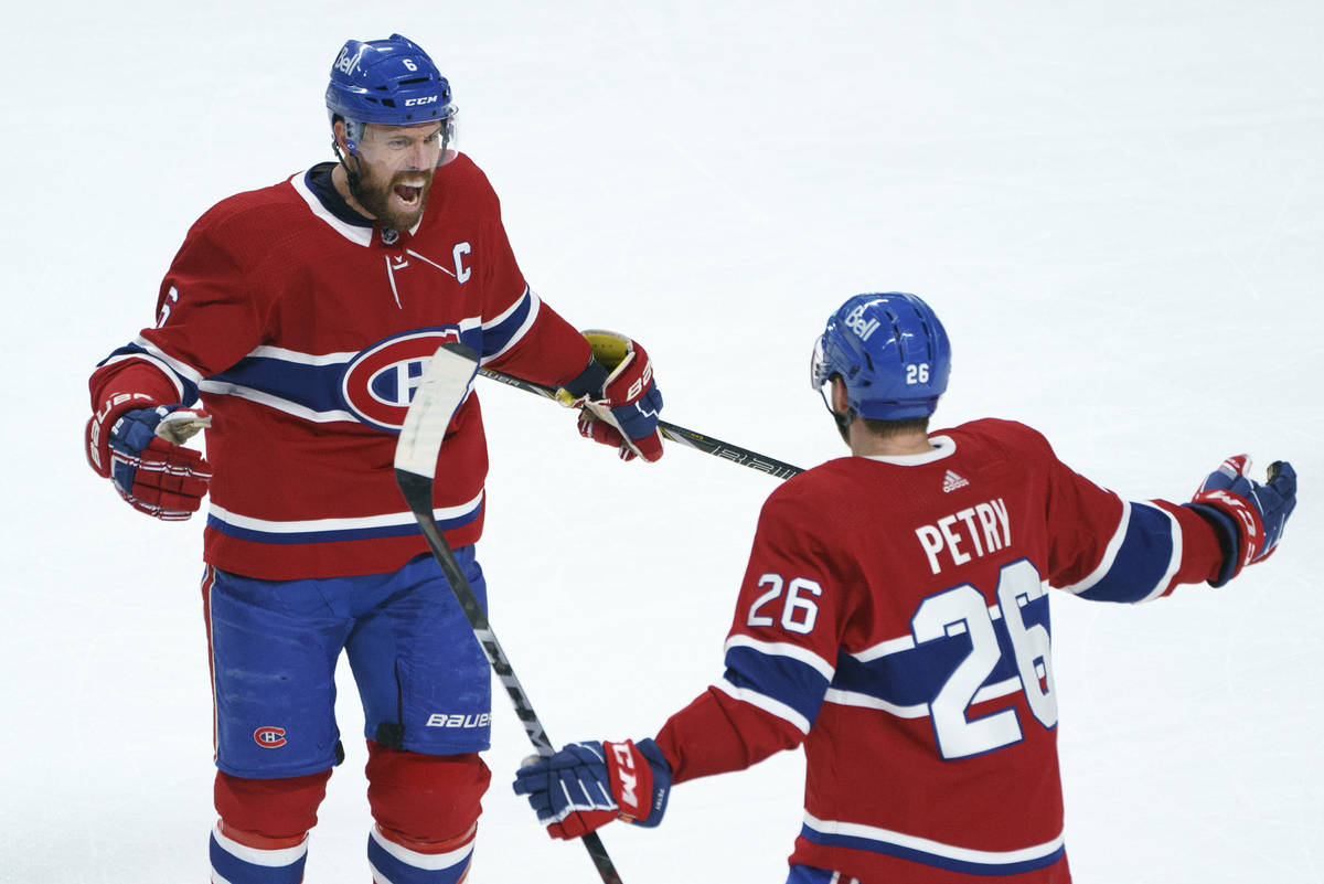 Montreal Canadiens' Shea Weber (6) celebrates his goal with teammate Jeff Petry during the firs ...