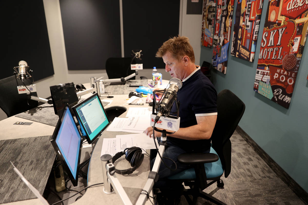 "State of Nevada" host Joe Schoenmann prepares for a show at Nevada Public Radio in L ...