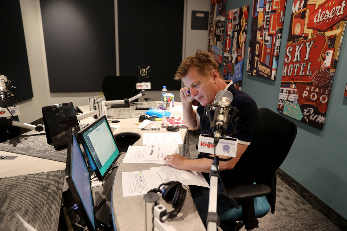 "State of Nevada" host Joe Schoenmann prepares for a show at Nevada Public Radio in L ...