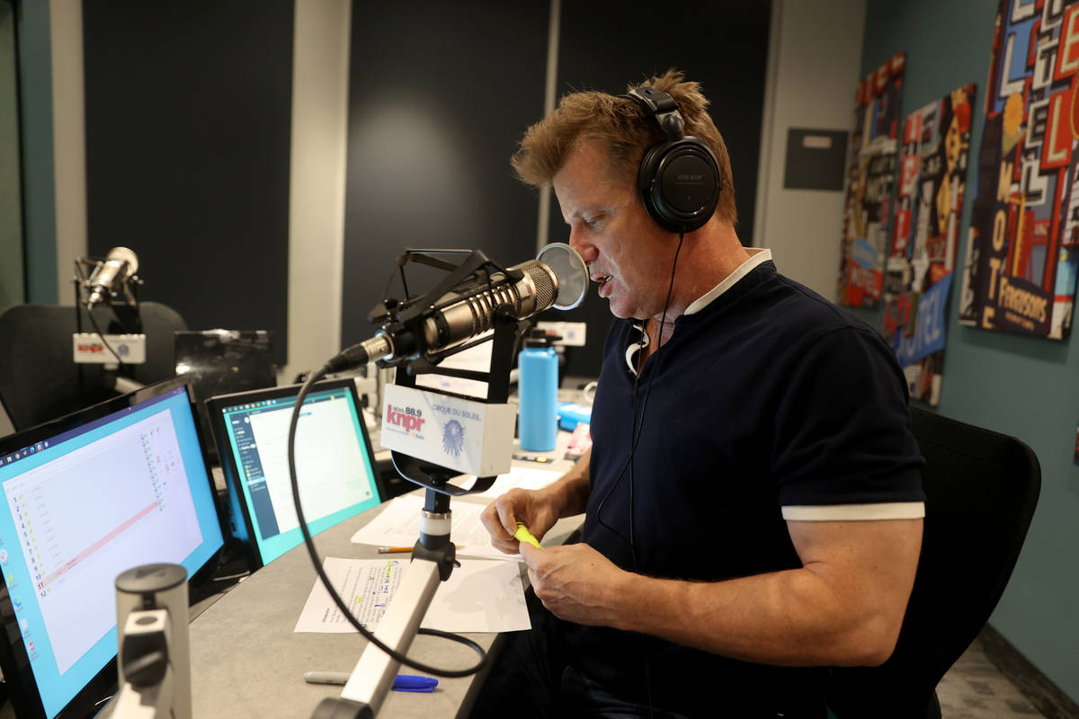 "State of Nevada" host Joe Schoenmann prepares for a show at Nevada Public Radio in L ...
