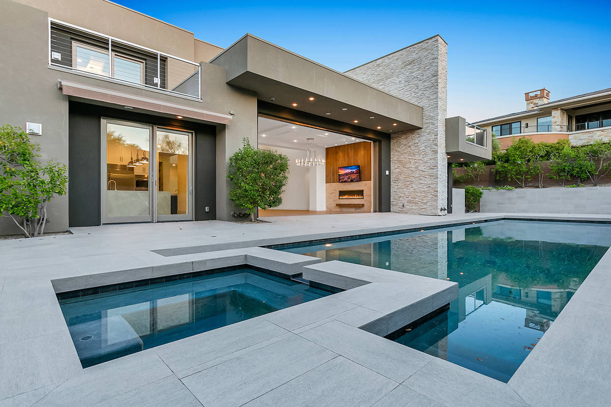 The home has a pool and spa in the resort-style backyard. (Ivan Sher Group)