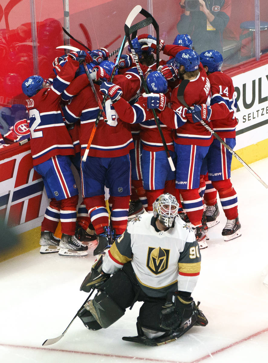 Vegas Golden Knights' Robin Lehner (90) kneels on the ice as Montreal Canadiens' Artturi Lehkon ...
