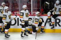 Vegas Golden Knights players watch the Montreal Canadiens celebrate following overtime in Game ...