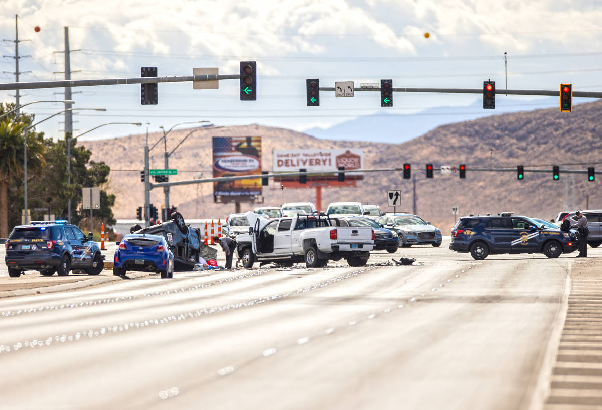 Nevada Highway Patrol investigate a suspected DUI crash that left 2 people dead at the intersec ...