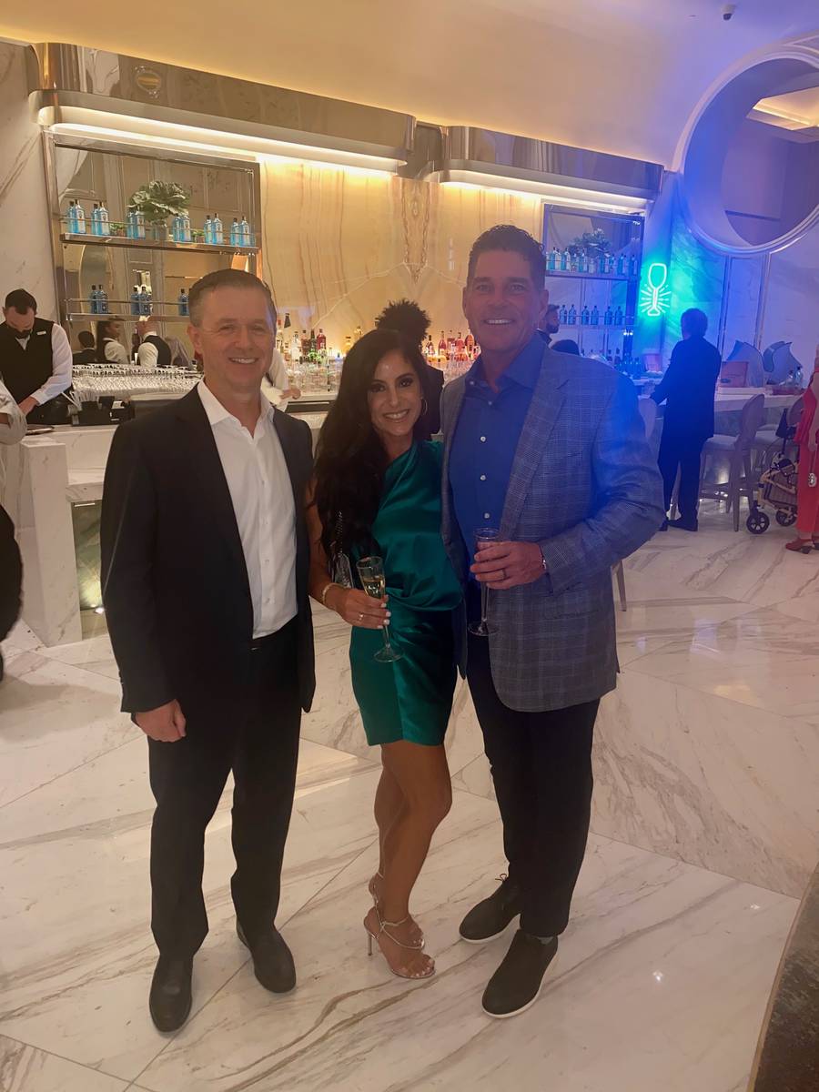 MGM Growth CEO James Stewart, far left, is shown with Shannon and Bill McBeath at the opening p ...