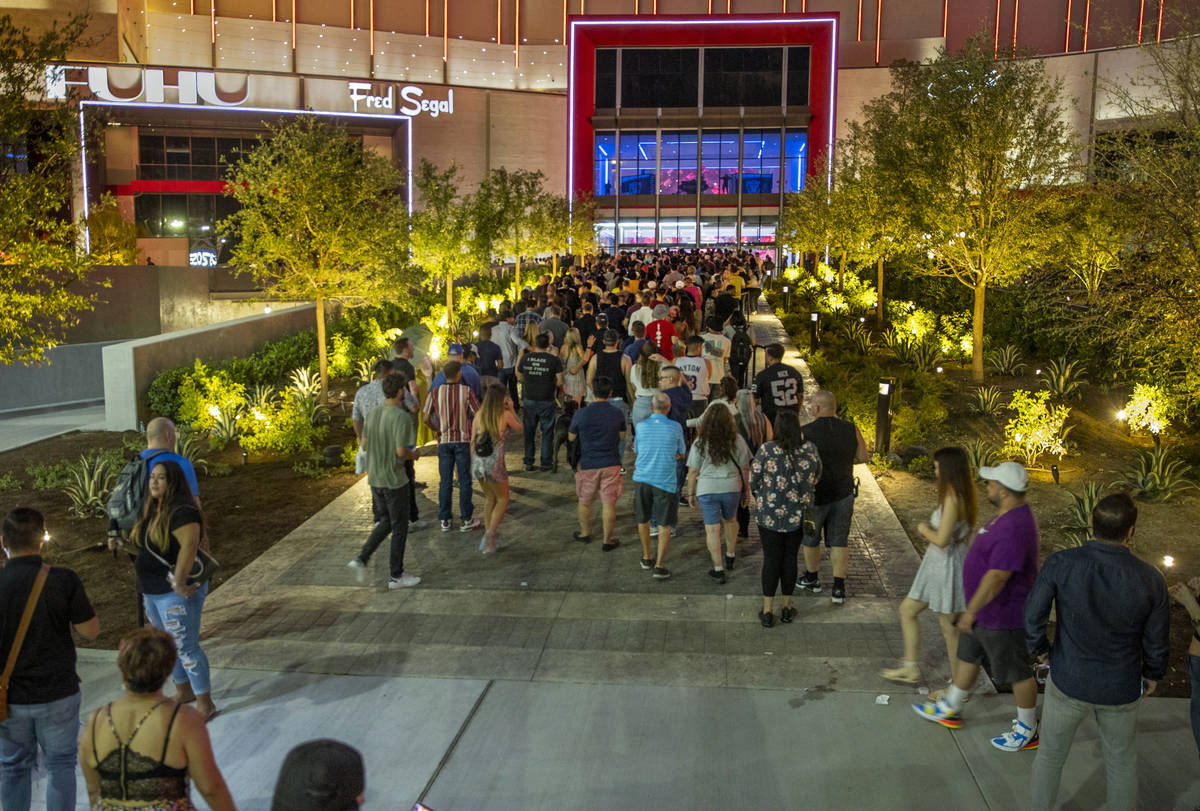 A large crowd gathers to enter for the Resorts World Las Vegas grand opening along the Strip on ...