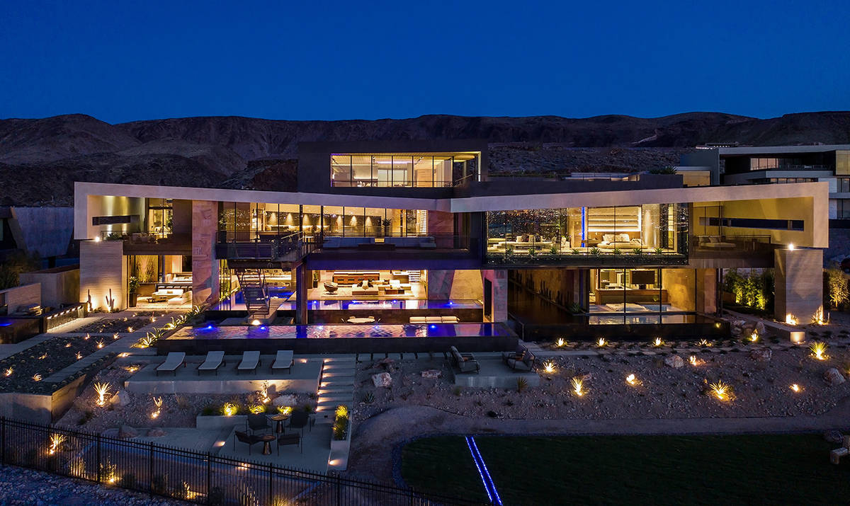 A luxury three-story home built on spec in MacDonald Highlands in Henderson has sold for $25 mi ...