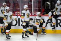 Vegas Golden Knights players watch the Montreal Canadiens celebrate following overtime in Game ...