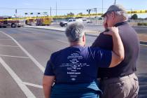 Pilot Ursula Richards, left, comforts fellow pilot Buzz Biernacki at the scene of the fatal hot ...