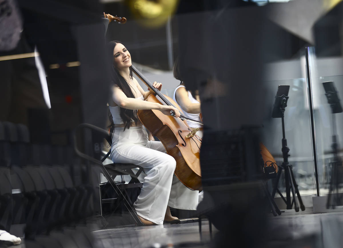 Members of David Perrico's Pop Strings band perform at Allegiant Stadium in Las Vegas on Monday ...