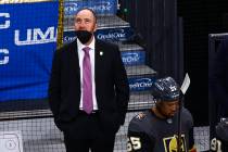 Golden Knights head coach Pete DeBoer looks on during the first period of Game 2 in an NHL hock ...