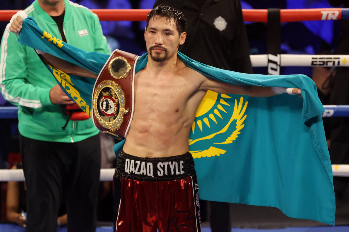 Janibek Alimkhanuly poses after defeating Rob Brant by way of technical knockout after the eigh ...