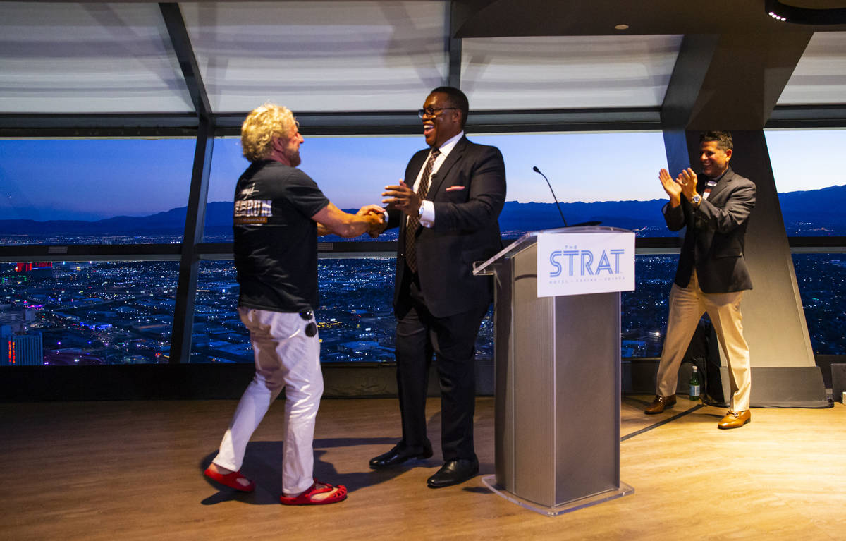 Sammy Hagar, left, is presented with a proclamation from Las Vegas City Councilman Cedric Crear ...