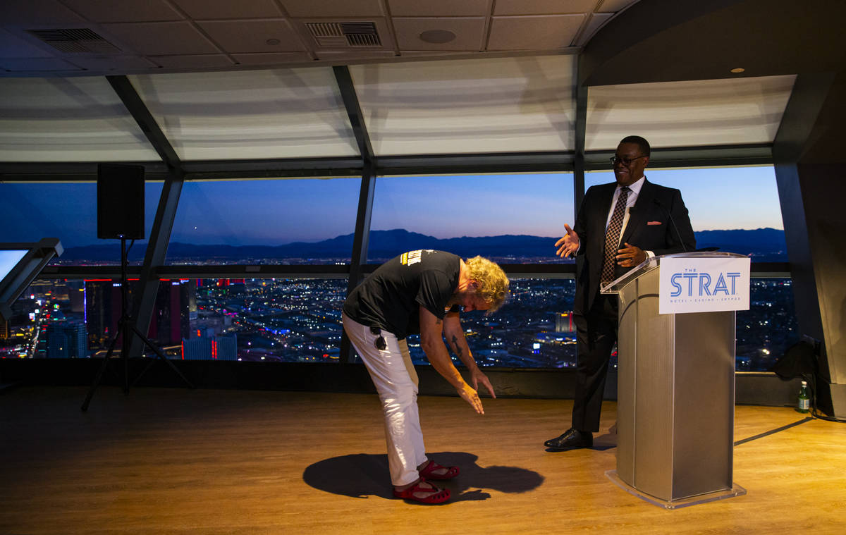Sammy Hagar, left, is presented with a proclamation from Las Vegas City Councilman Cedric Crear ...