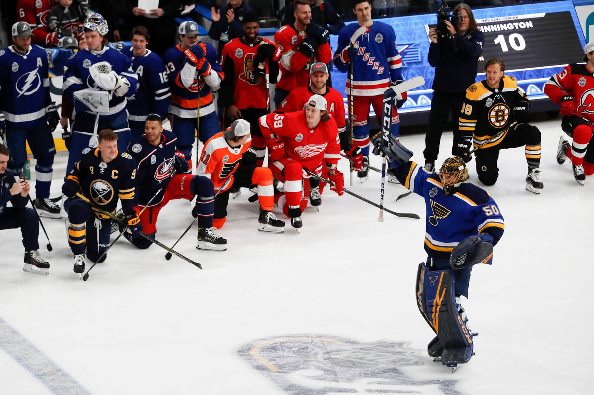 St. Louis Blues goalie Jordan Binnington (50) celebrates after winning the Skills Competition s ...