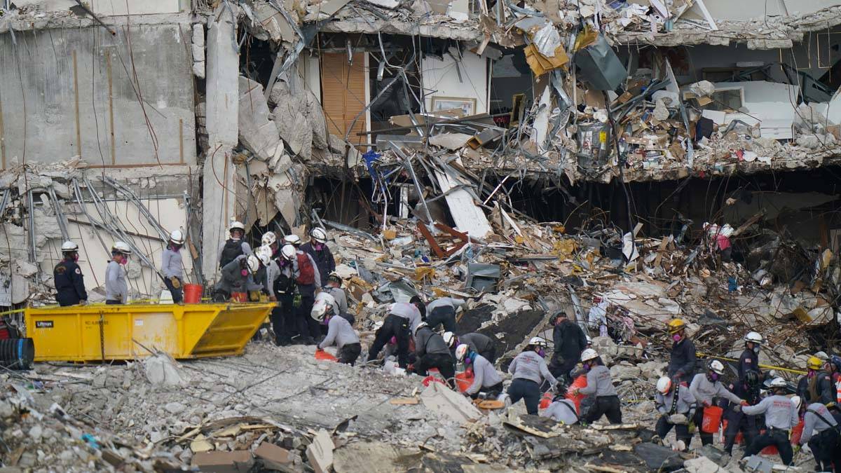 Crews work in the rubble Champlain Towers South condo, Tuesday, June 29, 2021, in Surfside, Fla ...