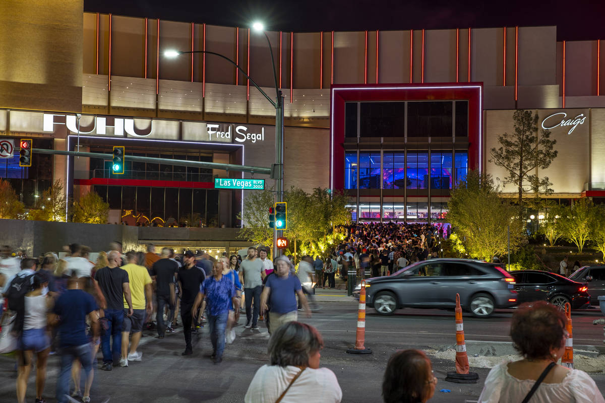 Pedestrians and auto traffic is heavy for the Resorts World Las Vegas grand opening along the S ...