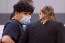 Jacob Gaona talks to his public defender Sarah Hawkins during an appearance in court at the Reg ...